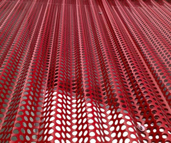 Perforated corrugated sheet with red color polyester painted