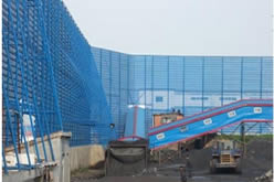 windbreak wall made from windbreak panels for wind control and dust pollution control in a coal factory open yard